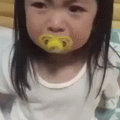 Little girl reacts to tear being wiped off her face while crying