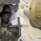 Rats eating ice cream through manhole cover