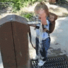 Little girl vs. water tap