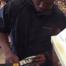 Guy tries to swipe dollar bill through card reader