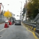 Car avoids out-of-control truck by driving backwards