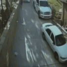 Woman stopping downhill car fail