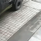 Truck tire air burst knocks down man