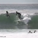 Surfer gets hit in the head by surfboard