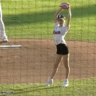 Asian girl baseball first pitch