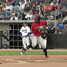 Baseball fan catches flying bat